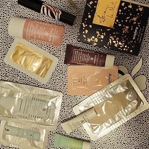 11pc Sisley Sample including 30mL Toning Lotion and 10mL black rose cream mask !